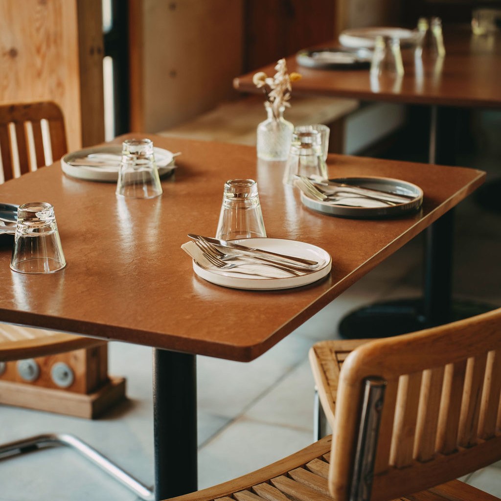 A set dining table at Dandelion, Eastwind Oliverea Valley
